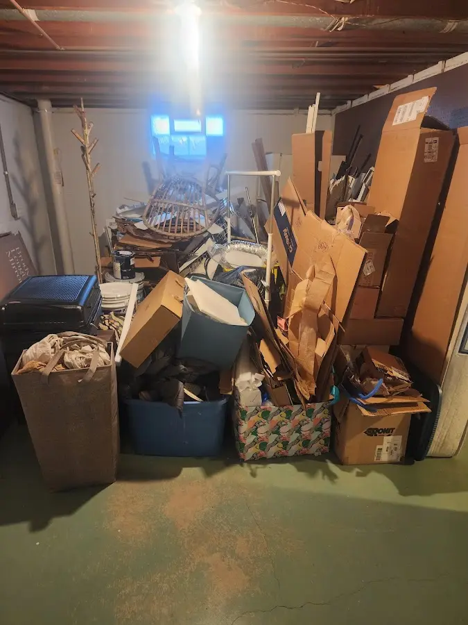 Roll-off dumpster container at job site for 15 Yard Dumpster Rental in Madeira